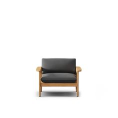 a black and brown chair on a white background with no one in the room around it