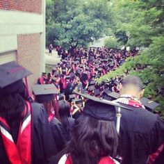 a large group of people in graduation gowns