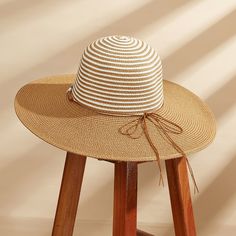 Need sun protection that's as stylish as it is practical? This Shell and Bead Wide Brim Straw Hat is your answer. With its wide brim and versatile design, it's perfect for keeping cool and looking chic. Whether you're looking for sun protection, a fashion statement, or a combination of both, there's a straw hat style to suit your needs and personal style. Product code: CAC03C4D006HG Brown Uv Protection Bucket Hat, Brown Sun Hat With Uv Protection For Beach Season, Brown Uv Protection Sun Hat For Beach Season, Brown Vacation Sun Hat For Outdoors, Brown Vacation Sun Hat For Outdoor, Brown Sun Hat For Outdoor Vacation, Brown Hats With Upf 50+ For Beach Season, Brown Upf 50+ Hats For Beach Season, Brown Upf 50+ Beach Hats