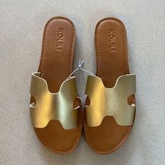 Kolili | Shoes | Nwot Kolili Gold Slide Sandals Size 75 | Poshmark Gold Leather Slides For The Beach, Gold Leather Beach Slides, Gold Synthetic Slide Sandals, Chic Gold Slip-on Slides, Yellow Non-slip Slide Sandals, Gold Slides, Slide Sandals, Slides, Leather Upper