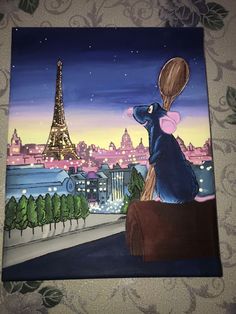 a painting of a dog looking at the eiffel tower