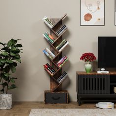 a living room with a television and bookshelf next to a potted plant