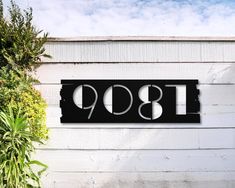 a sign on the side of a building that says 898