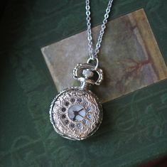 Silver Steampunk Pocket Watch With Locket, Steampunk Silver Pocket Watch With Locket, Silver Pocket Watch With Locket As Gift, Silver Metal Pocket Watch With Compass Design, Silver Pocket Watch With Locket Pendant, Pocket Watch Necklace, Silver Pocket Watch, Mechanical Pocket Watch, Romantic Scenes