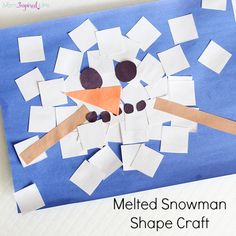 a snowman shape craft made out of construction paper and cut into squares to make it