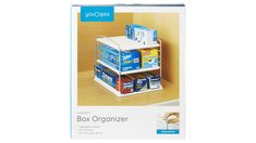 the box organizer is sitting on top of a shelf