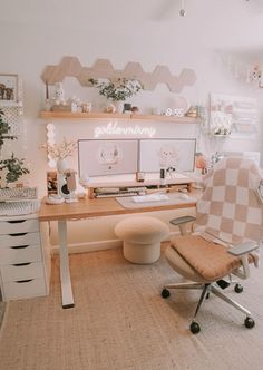 a desk with two computer screens on it and a chair in front of the monitor