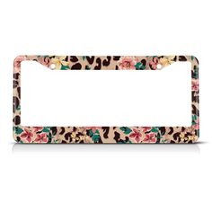 a leopard print license plate holder with flowers on the front and bottom, along with a white background