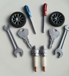 there are many different tools in the shape of a wheel and wrench on top of each other