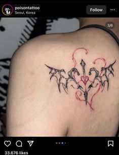 a tattoo on the back of a woman's shoulder with an arrow and hearts