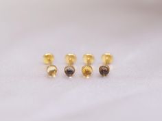 ❝ Introducing our exquisite threadless push pin studs featuring the captivating combination of citrine and smoky quartz cabochons. The harmonious pairing of these two stunning gemstones creates a visually captivating and enchanting display. Designed with your comfort in mind, our threadless push pin studs offer a seamless fit with their flat back design. Each stud is meticulously handcrafted in our Toronto studio, reflecting exceptional craftsmanship and style. Elevate your jewelry collection wi Cartilage Earring, Natural Citrine, Clean Hands, Cartilage Earrings, Push Pin, Steel Jewelry, Smoky Quartz, Piercing Jewelry, Jewelry Earrings Studs