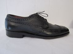 "Vintage 1950s 60s black Ranch Oxhide leather wing tip shoes. Lace up. High quality, made in England By Church's. Size 9. The soles measure 11.75\" long and 4.25\" wide. Shoes are in very good condition with some minor scratches." Retro Black Oxfords For Derby, Retro Black Wingtip Oxfords, Retro Black Cap Toe Oxfords, Retro Black Oxfords With Leather Sole, Retro Formal Oxfords With Leather Sole, Retro Wingtip Oxfords For Business, Vintage Black Cap Toe Leather Shoes, Retro Leather Sole Oxfords For Formal Wear, Vintage Brogue Dress Shoes For Office