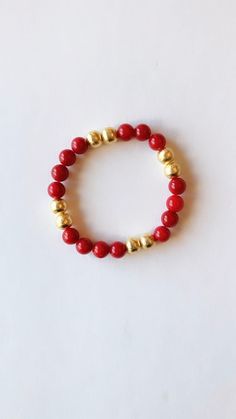 Perfect bracelet to add to your Holiday stack!  This listing is for 1 bracelet Made with a beautiful 8mm red gemstone beads and brushed gold plated beads. The beads are strung on a durable, stretchy cord so they are easy and comfortable to wear.  Mix+match your bracelets to create your own style! Red Round Beads Bracelet For Everyday, Everyday Red Stretch Bracelet With Round Beads, Adjustable Red Stretch Bracelet For Everyday, Elegant Red Stretch Bracelet With 8mm Beads, Gold Beaded Bracelets For Holiday, Adjustable Red Stretch Bracelet With 8mm Beads, Adjustable Gold Beaded Bracelets For Holiday, Red Spiritual Beaded Bracelets For Everyday, Spiritual Red Beaded Bracelets For Everyday