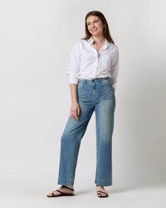 The most tomboyish fit in our denim lineup: a flattering, straight, column leg with a high-ish rise and patch pocket detailing at the hip. No high-tech fabric composition, no fussy back pocket stitching, no magic seam placement... just a classic pair of jeans that makes you look like a better, more pulled-together version of yourself. Each pair is made in Los Angeles — just like our men's jeans — out of soft stretch Cone Mills denim in a perfectly faded, seven-years-worn-in shade of blue. Ann Mashburn, Pocket Stitching, Clothing Catalog, Buckle Shoes, Sweater Gift, Liberty Fabric, Sweater Pants, Pocket Jeans, Pocket Detail