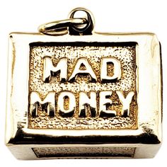 14 Karat Yellow Gold Mad Money Charm- Never leave home without your "mad money"! This fun charm features a 3D box with the words "MAD MONEY" embossed on its front. a $1 bill is encased inside. Meticulously detailed in 14K yellow gold. *Chain not included Size: 11 mm x 14 mm Weight: 3.4 dwt. / 5.3 gr. Stamped: 14K Hallmark: BEATON Very good condition, professionally polished. Will come packaged in a gift box or pouch (when possible). Mad Money, You Mad, Brunch Outfit, The Words, In 3d, Vintage Charms, Hallmark, Gift Box, Charm Bracelet