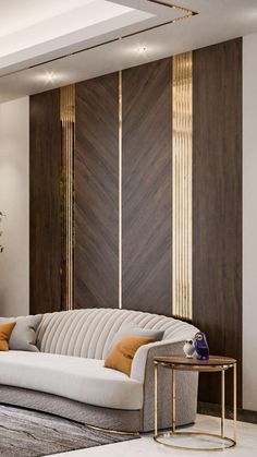 a living room filled with furniture next to a wall mounted planter and wooden paneled walls