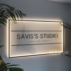 a sign that says savis's studio skin care and beauty on the wall