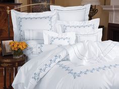 the comforter is white and has blue trimmings on it's edges