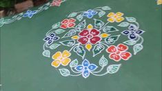 an artistically painted flower design on the ground