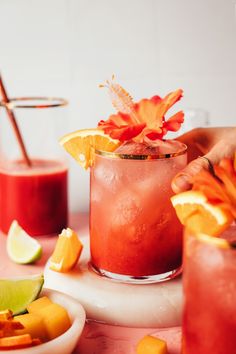 Light Recipes For Summer, Hibiscus Martini, Hibiscus Mocktail, Moscow Mule Mocktail Recipe, Pretty Mocktail Recipe, Orange Mocktail, Light Drinks, Dried Hibiscus Flowers, Minimalist Baker