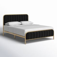 an image of a bed with white sheets and black headboard on the bottom side