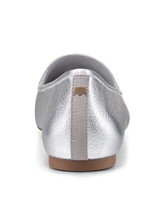 Classic loafers, reinvented. The understated silhouette of our Vesper is elevated with tumbled metallic Nappa leather. High shine and a sleek design allows this striking silver shade to catch the light as you walk. This uniquely relaxed loafer has a flexible toe and heel reinforcement so that you feel supported with every step. We lined our footbeds with a soft breathable leather for added luxury and durability. | The Vesper - Silver Leather Birdies Flats Classic Loafers, Sandals For Sale, Outdoor Wear, Nappa Leather, Womens Flats, Sleek Design, Loafers, Sleek, Silver