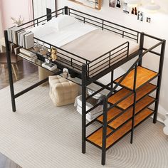 a bunk bed with drawers underneath it in a room next to a couch and chair