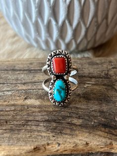 "Here we have a lovely Women's custom ring with natural sleeping beauty turquoise and Coral. This item was made by JR \"Lucky\". The ring size is 6.75. Type: Ring Metal: Silver Purity: Sterling (.925) Weight: 5.6 Grams Measurements (Face MM): 27.78 x 12.82 Stone/s: Sleeping BeautyTurquoise Maker: JR \"Lucky\" Size: 6.75 Item#: R0459" Southwestern Multi-stone Oval Turquoise Ring, Southwestern Oval Turquoise Multi-stone Ring, Southwestern Oval Multi-stone Rings, Southwestern Style Oval Multi-stone Rings, Adjustable Red Turquoise Ring As Gift, Handmade Southwestern Open Ring, Handmade Southwestern Style Open Ring, Southwestern Handmade Open Ring, Adjustable Southwestern Red Rings