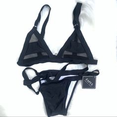 This Sexy Zaful Bikini Features A Flirty Bralette Top With Sheer Mesh Windows And A Strappy, Cheeky Bottom. It’s Unworn And A Size M. I’m About A 38c & This Top Was Too Small. I Considered Using The Bottom So I Didn’t Return The Suit. Then Never Even Tried On The Bottomseems A Bit Small For Me Too. Consider My Size Vs Yours Before Ordering! Band On The Bikini Top Is 29.5 Inches Straps From Top Of Triangle To Back Is 14.5 Inches Band That Will Be On Your Hips Is 33 Inches, The Loose One Above It Edgy Party Swimwear For Summer, Edgy Summer Party Swimwear, Strappy Swimwear For Summer Night Out, Summer Strappy Swimwear For Night Out, Trendy Black Triangle Top Swimwear, Black Mesh Swimwear For Summer, Underwire Swimwear For Summer Nights Out, Edgy Black Swimwear For Summer, Black Mesh Swimwear For Vacation