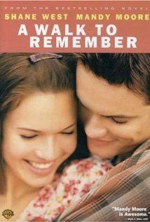 a walk to remember movie poster with a man and woman hugging each other, text reads,