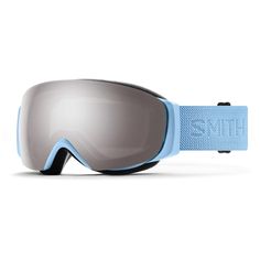 a pair of ski goggles sitting on top of a white surface with blue straps