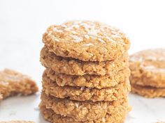 a stack of oatmeal cookies sitting on top of a white countertop