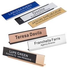 four different name tags are shown in three different colors and sizes, one is gold, the other is black