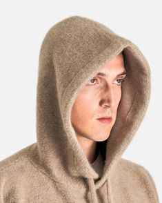 The Row Terry Top in Beige. This sweatshirt features a double-lined hood, extra-long drawstring, dropped shoulder seams, rolled cuffs and a straight hem. Mend Frayed Sweater Cuff, Extra Long, Drop Shoulder, The Row, Sweatshirts