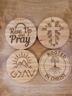 four wooden coasters with the words rise up and pray, rooted in christ