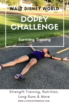 a woman laying on the ground in front of a sign that says dopey challenge