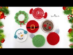 crocheted christmas ornaments are arranged on the table