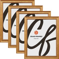 three gold frames with black and white designs on the front, one has a large letter g