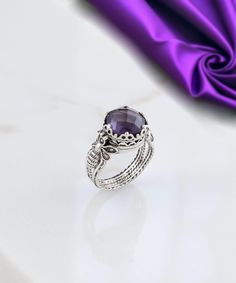 Amethyst Silver Filigree Bee Cocktail Ring, 925 Oxidized Sterling Silver Artisan Handmade Bumble Bee Victorian Statement Ring Honey Bee Ring Purple stone ring, gift ring for her, insects bug jewelry, dainty purple ring, round statement ring, handmade women ring Material: 925 Sterling Silver ( NICKEL FREE ) Gemstone: Amethyst 10 mm. -The stone used in this jewelry, Amethyst Gemstone, is the February Birthstone. FREE, FAST AND TRACKABLE SHIPPING FOR ALL EU COUNTRIES AND USA. COMES WİTH VELVET POUCH AND LUXURY GİFT BOX. Show off this gorgeous purple stone ring at any occasion. This eye catching ring is perfect to add glam to any outfit with Bumble bee detail and Amethyst Gemstone. This vintage, original, and stylish luxury jewelry is perfect for wearing at parties, festivals and everyday life Fine Jewelry Butterfly Ring With Gemstone, White Gold Amethyst Ring With Polished Finish, Silver Butterfly Ring With Gemstone Fine Jewelry, Elegant Sterling Silver Cabochon Amethyst Ring, Elegant Sterling Silver Amethyst Cabochon Ring, Silver Butterfly Ring With Gemstone In Fine Jewelry Style, Elegant Amethyst Cabochon Ring In Sterling Silver, Silver Butterfly Ring With Prong Setting, Gemstone Butterfly Ring For Anniversary