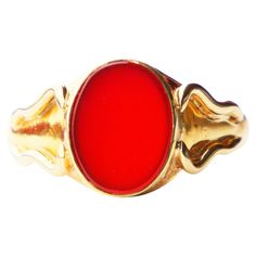 Signet Ring for Men or Women crafted in solid 23K Gold with dark Red plate of Carnelian stone 13 mm x 10 mm x 2.75 deep / ca 3 ct. Stone has well polished flat surface. Shoulders with wavy ornaments. The band is 4mm wide. Swedish hallmarks, 23K, maker's and Year combination is E7 / hand-made in 1907. In fine used condition. Stone with minor scratches visible under x 10 magnification. Size: 11.5 US / 21 mm. This ring can be sized for additional payment. > Most of the items that we sell are not ne Classic Oval Hallmarked Enamel Ring, Heirloom Red Signet Ring With Polished Finish, Formal Carnelian Signet Ring With Polished Finish, Classic Red Oval Cabochon Signet Ring, Classic Carnelian Signet Ring With Polished Finish, Classic Carnelian Signet Ring For Formal Occasions, Classic Carnelian Signet Ring For Formal Events, Red Oval Cabochon Signet Ring For Formal Occasions, Classic Red Intaglio Ring