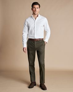 Smart Stretch Texture Trousers - Olive Green | Men's Charles Tyrwhitt Smart Stretch Texture Trousers - Olive Green Size W30 L30 Cotton Relaxed Mens Wedding Attire, Men’s Outfit For Wedding Guest, Green Formal Pants Outfit Men, Olive Dress Pants Outfit Men, Mens Wedding Rehearsal Outfit, Mens Welcome Party Outfit, Business Casual Chinos Men, Men’s Work Attire, Mens Outfits Wedding Guest