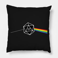 a black pillow with the dark side of the moon on it and a rainbow in the middle