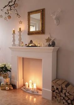 a living room with a fire place and christmas decorations