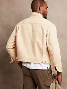 Casual and iconic, this classic trucker jacket is crafted from 100% organic cotton with a bit of stretch for comfort.  WARM: Unlined and perfect for layering.  RELAXED FIT: Almost oversized, this style is cut with extra room.  ORGANIC: Made with cert Relaxed Fit Beige Cotton Denim Jacket, Relaxed Fit Denim Jacket With Pockets, Beige Relaxed Fit Cotton Denim Jacket, Relaxed Fit Denim Jacket, Relaxed Fit Denim Jacket With Pockets For Layering, Relaxed Fit Denim Jacket For Layering, Beige Cotton Outerwear For Layering, Beige Cotton Denim Jacket With Pockets, Relaxed Fit Washed Utility Jacket For Everyday