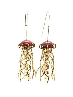 These playful handcrafted jellyfish earrings are perfect whimsical everyday or special occasion wear. Sterling Silver earwires make these comfortable to wear, and ideal for gifting! Contact us with any questions about this piece or custom pieces at alimorse.jewelry@gmail.com.  Process video: https://www.instagram.com/reel/CekHs8TprSz/ Whimsical Wire Wrapped Earrings For Party, Adjustable Wire Wrapped Whimsical Earrings, Whimsical Adjustable Wire Wrapped Earrings, Gold Jellyfish, Jellyfish Earrings, Jellyfish Earring, Jellyfish Jewelry Necklace, Ocean-inspired Shell Shaped Jewelry With Matching Earrings, Jellyfish