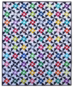 a quilt made with different colored squares