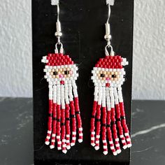 Brick stitched with Delica beads. Xmas 2024, Christmas Bead, Delica Beads, Christmas Earrings, Brick Stitch, Fringe Earrings, Jewelry Ideas, Halloween Shopping, Jewelry Earrings Dangle