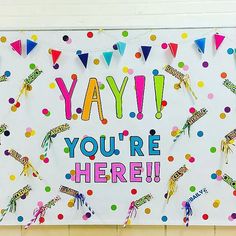 a bulletin board that says yayi you're here