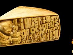 a carved object with words written on it