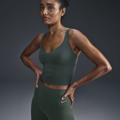 Move effortlessly from your morning walk to all the activities that follow in this stretchy, sweat-wicking tank top that feels like a second skin. The fully sewn-in bra helps resist shifting and offers medium support that gives you a snug hold, helping keep everything in place. Sculpting Sleeveless Activewear For Sports, Green Compressive Seamless Tank Top, Green Sports Bra With Tank Straps For Workout, Green Tank Straps Activewear For Sports, Green Seamless Tank Activewear, Sporty High Stretch Bra-friendly Tank Top, Green Bra-friendly Athleisure Tank Top, Green Bra Friendly Athleisure Tank Top, Sporty High-stretch Bra-friendly Tank Top